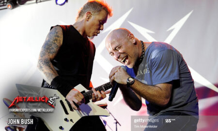 Singer John Bush on stage with James Hetfield. Photo by Tim Mosenfelder